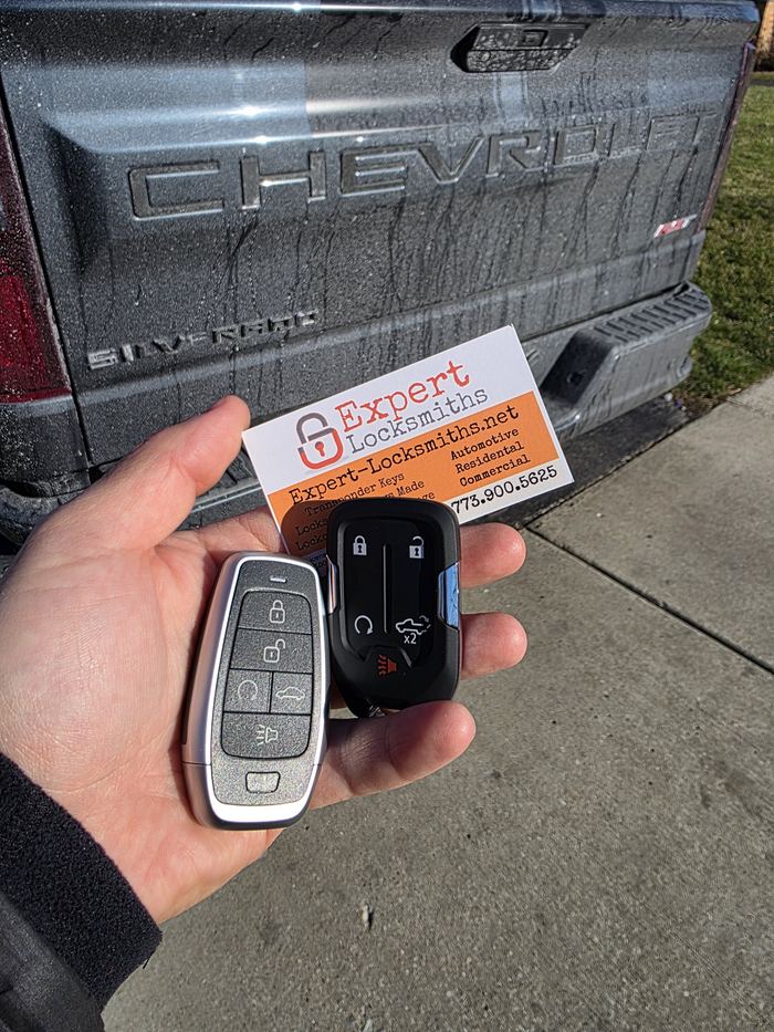 Replacement car key being cut for a customer